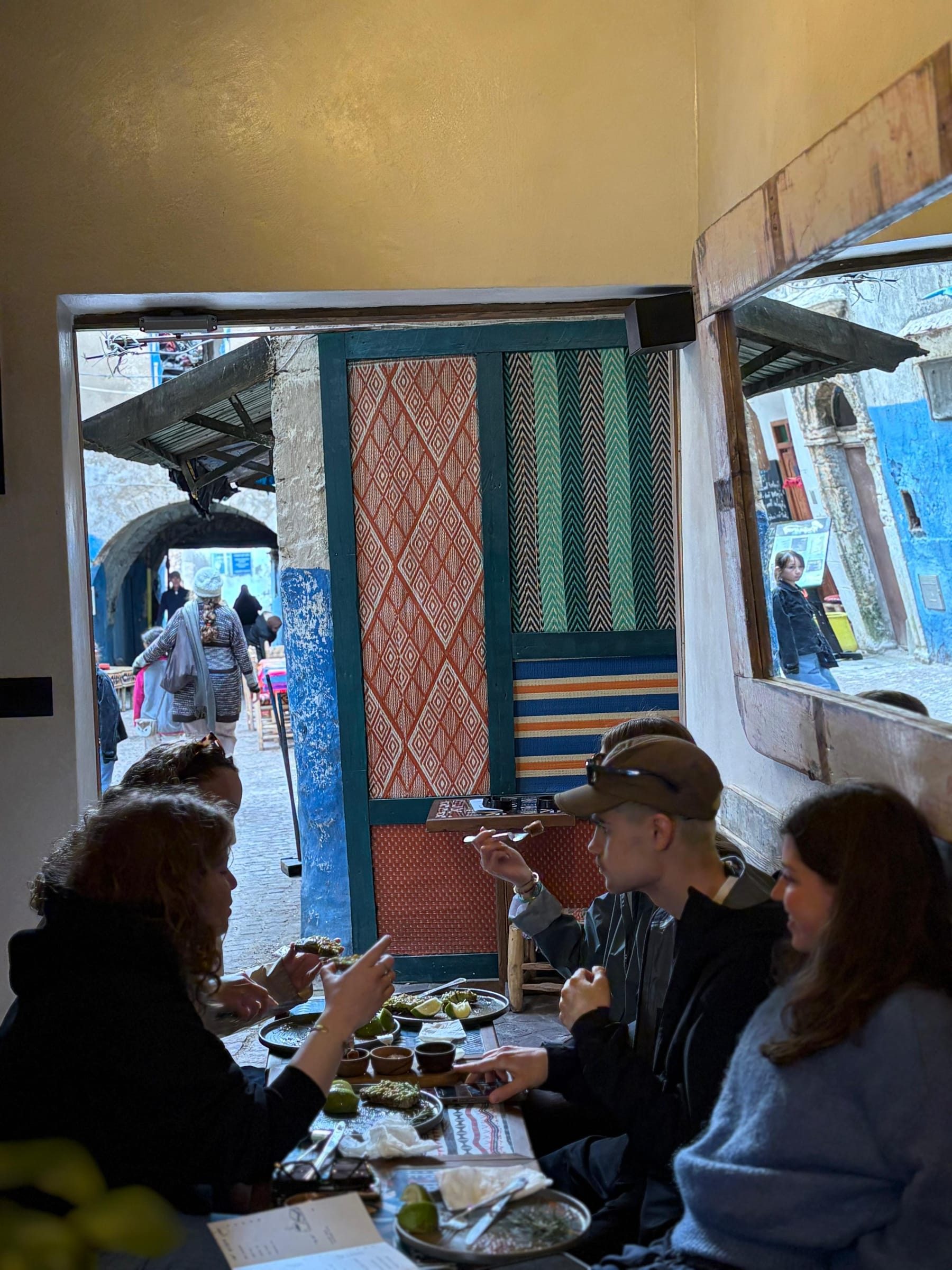 Evening light inside Simane with guests at the tables