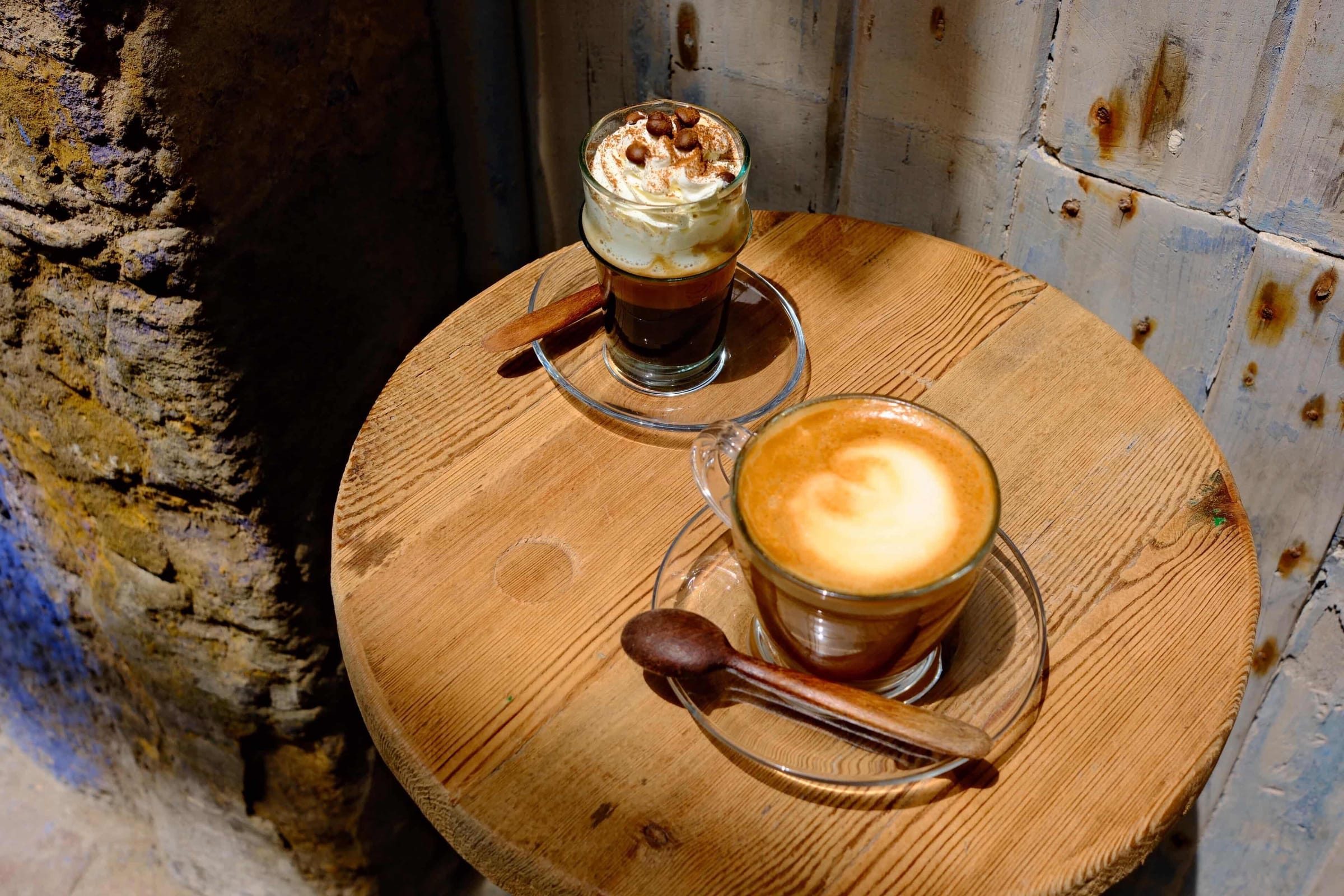 A cortado in a glass